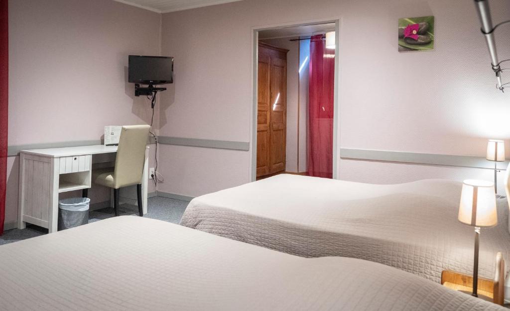 Postel nebo postele na pokoji v ubytování Hotel de l'Europe