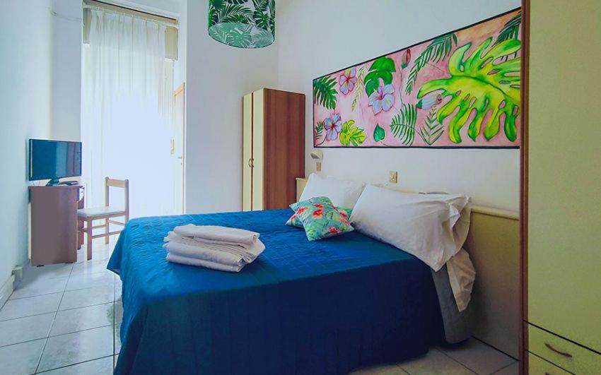 Postel nebo postele na pokoji v ubytování Hotel Buenos Aires