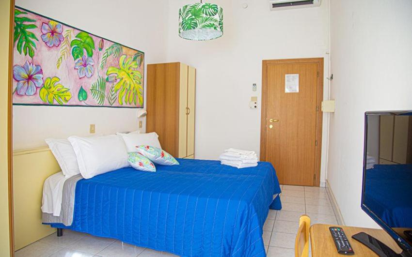 Postel nebo postele na pokoji v ubytování Hotel Buenos Aires