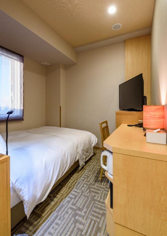 TV a/nebo společenská místnost v ubytování QuintessaHotel TokyoHaneda Comic&Books