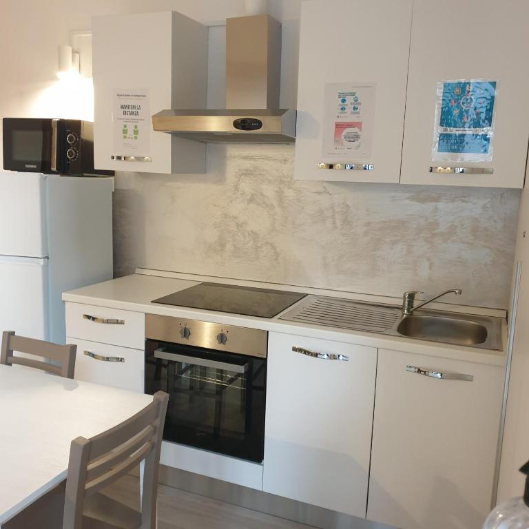 Kuchyň nebo kuchyňský kout v ubytování Bergamo City - Self Check-in