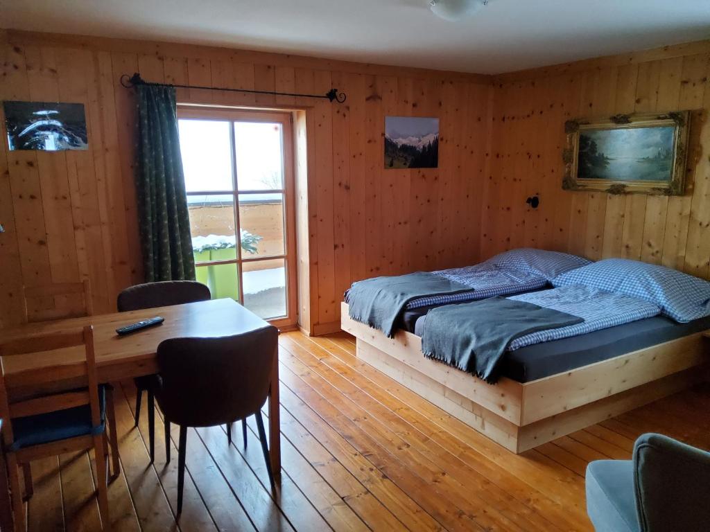 Postel nebo postele na pokoji v ubytování Fasserhof