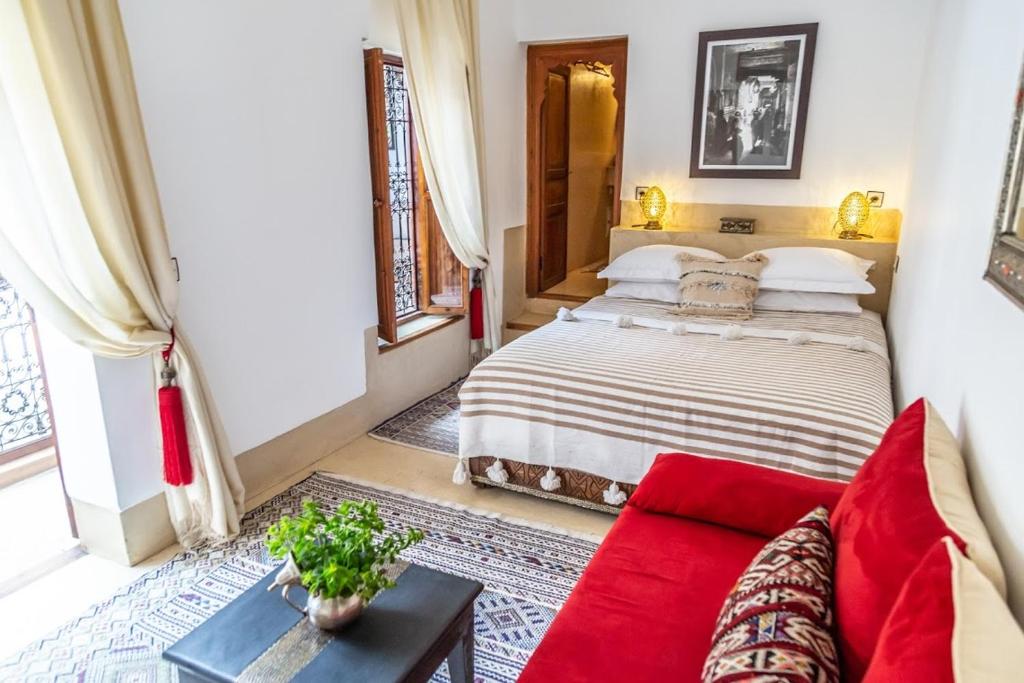 Postel nebo postele na pokoji v ubytování Riad Smara
