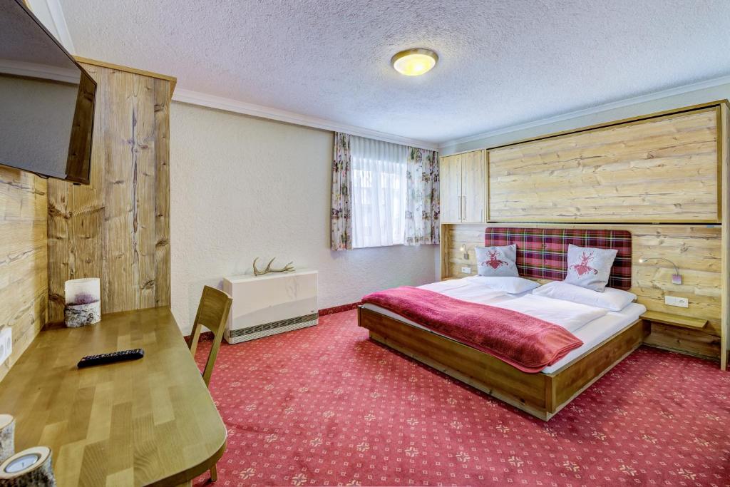 Postel nebo postele na pokoji v ubytování Mountainlovers Berghotel SeidlAlm