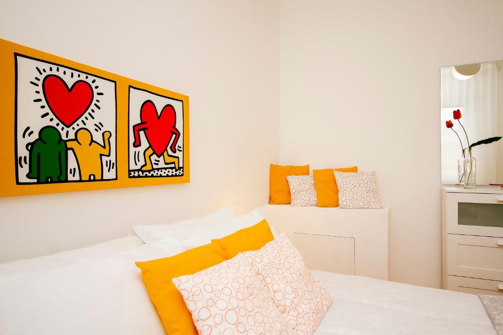 Posteľ alebo postele v izbe v ubytovaní InnPisaRentals - Keith Haring's House