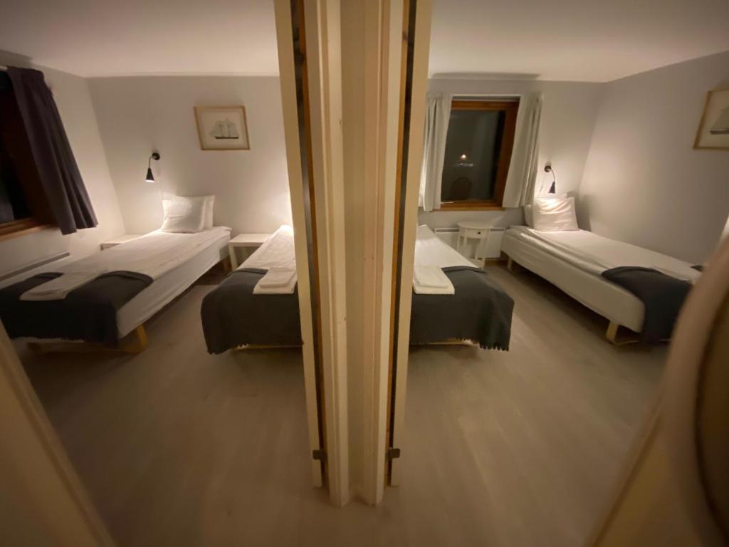 Postel nebo postele na pokoji v ubytování Alvaret Hotel & Hostel