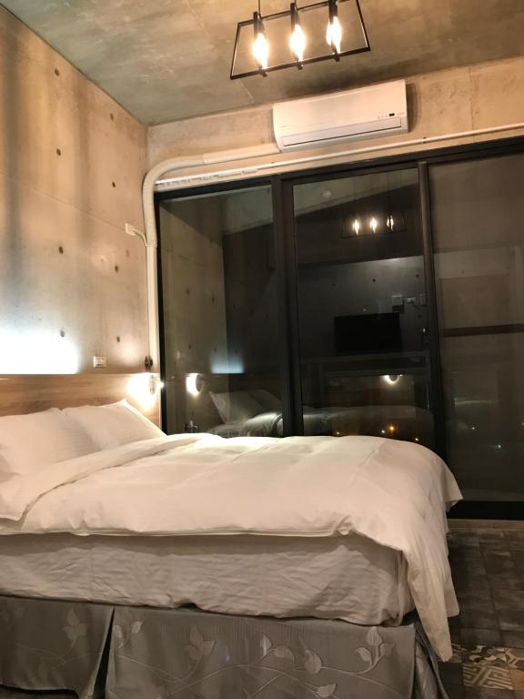 Postel nebo postele na pokoji v ubytování LOL B&B