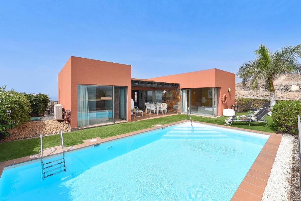 The swimming pool at or close to Albatross by VillaGranCanaria