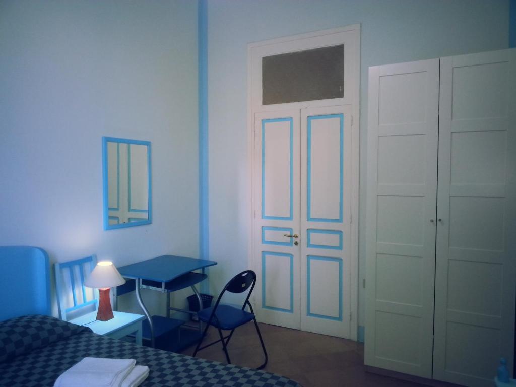 A bed or beds in a room at Il Giardino Del Purgatorio