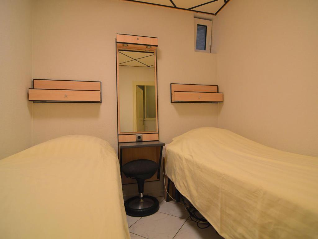 Кровать или кровати в номере Holiday home with pool, sauna