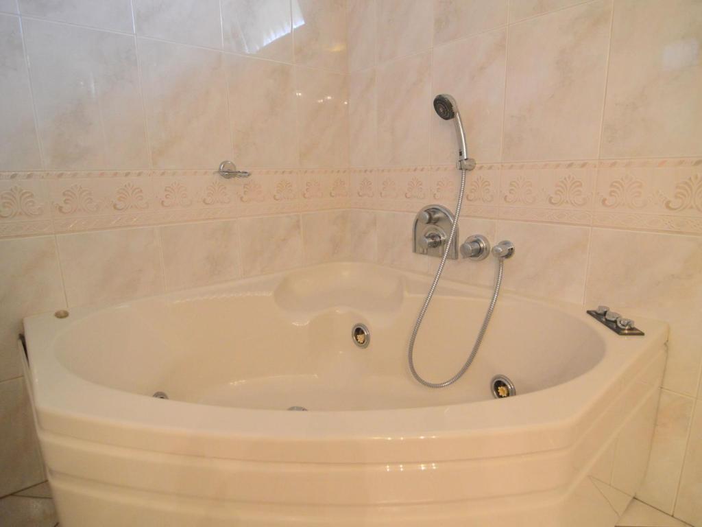 Ванная комната в Holiday home with pool, sauna