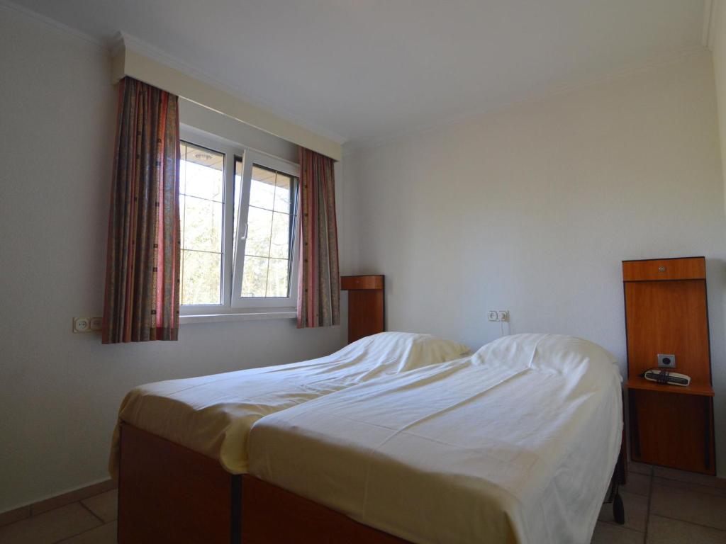 Кровать или кровати в номере Holiday home with pool, sauna