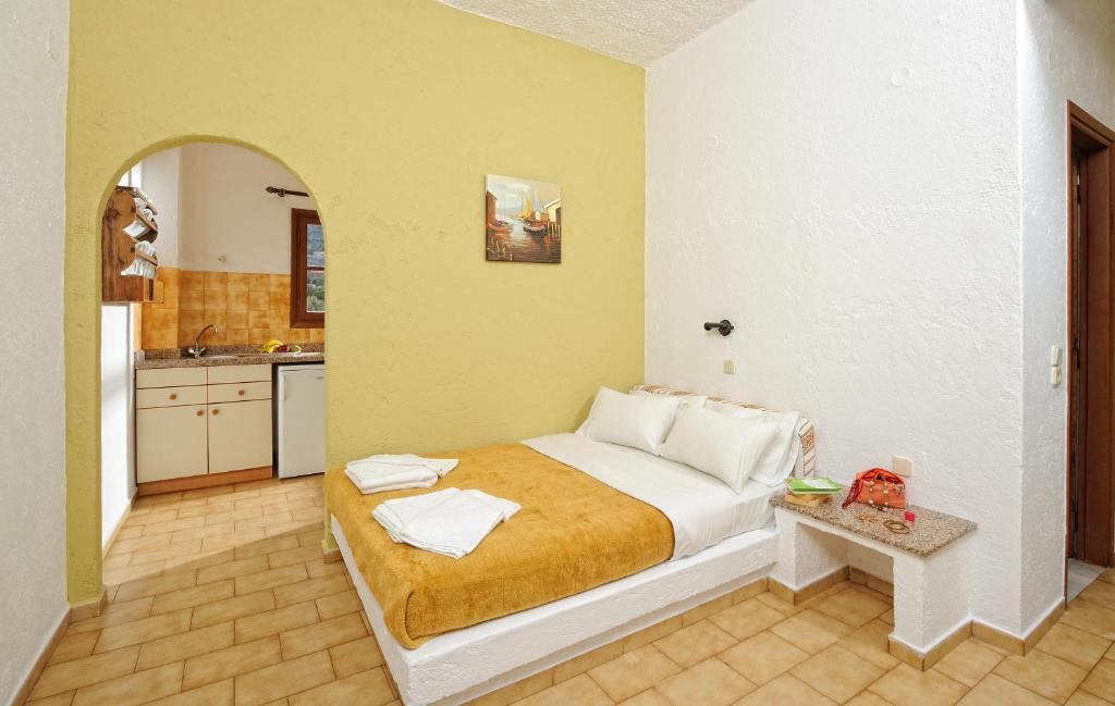 Posteľ alebo postele v izbe v ubytovaní Stelios Residence Apartments
