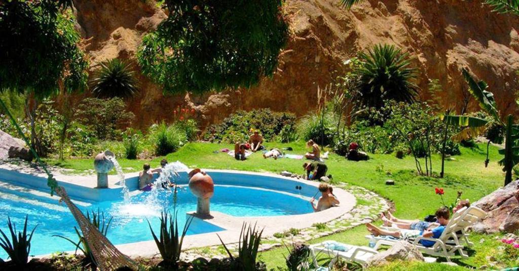 Bazén v ubytování Paraiso Las Palmeras Lodge nebo v jeho okolí