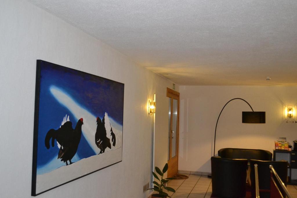 TV a/nebo společenská místnost v ubytování Schorta's Alvetern - Boutique Hotel & Restaurant