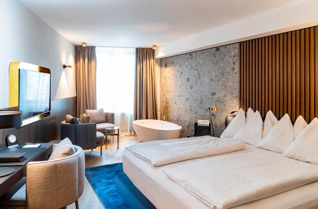 Posteľ alebo postele v izbe v ubytovaní Hotel Innsbruck