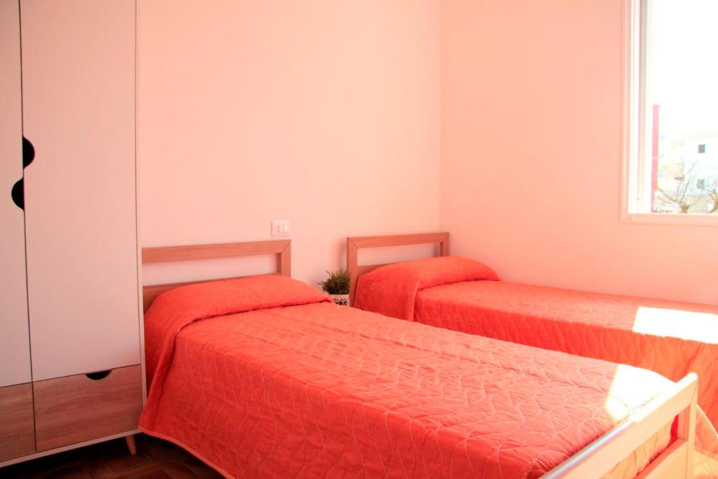 Łóżko lub łóżka w pokoju w obiekcie Pasubio 1