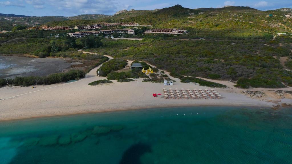 an aerial view of a beach with a resort at Residence Portolaconia Appartamenti in Cannigione