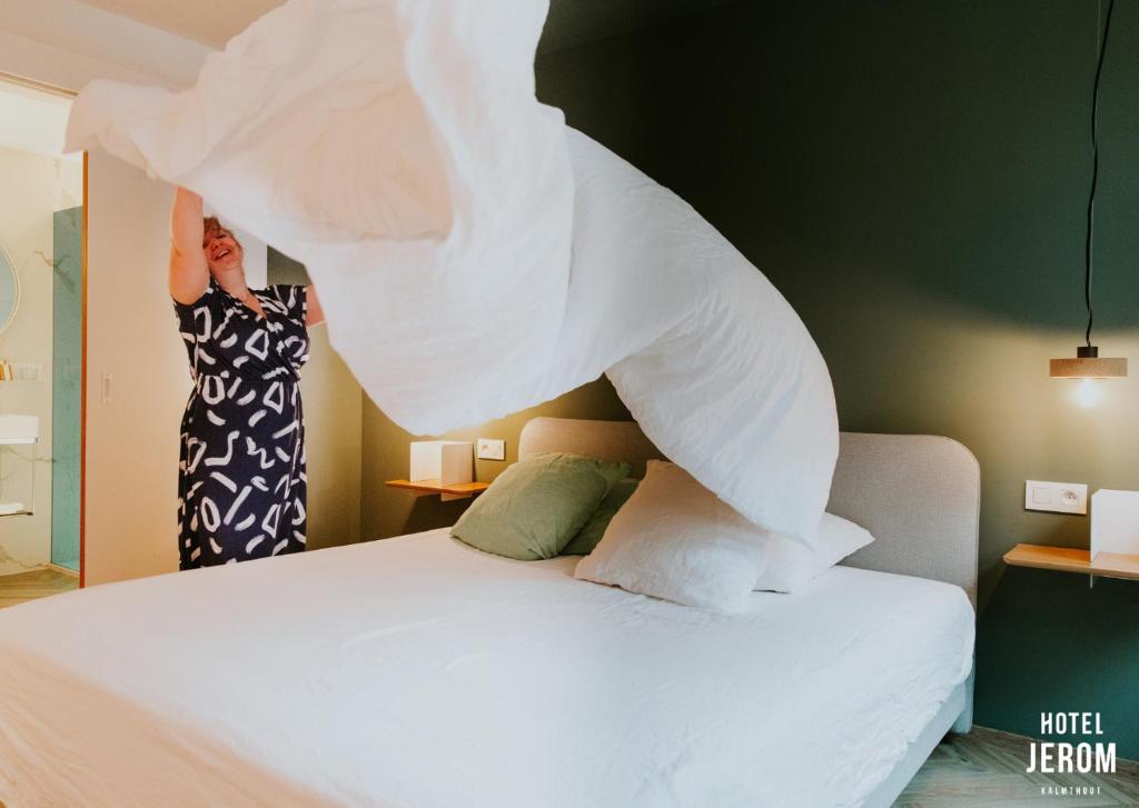 Postel nebo postele na pokoji v ubytování Hotel Jerom