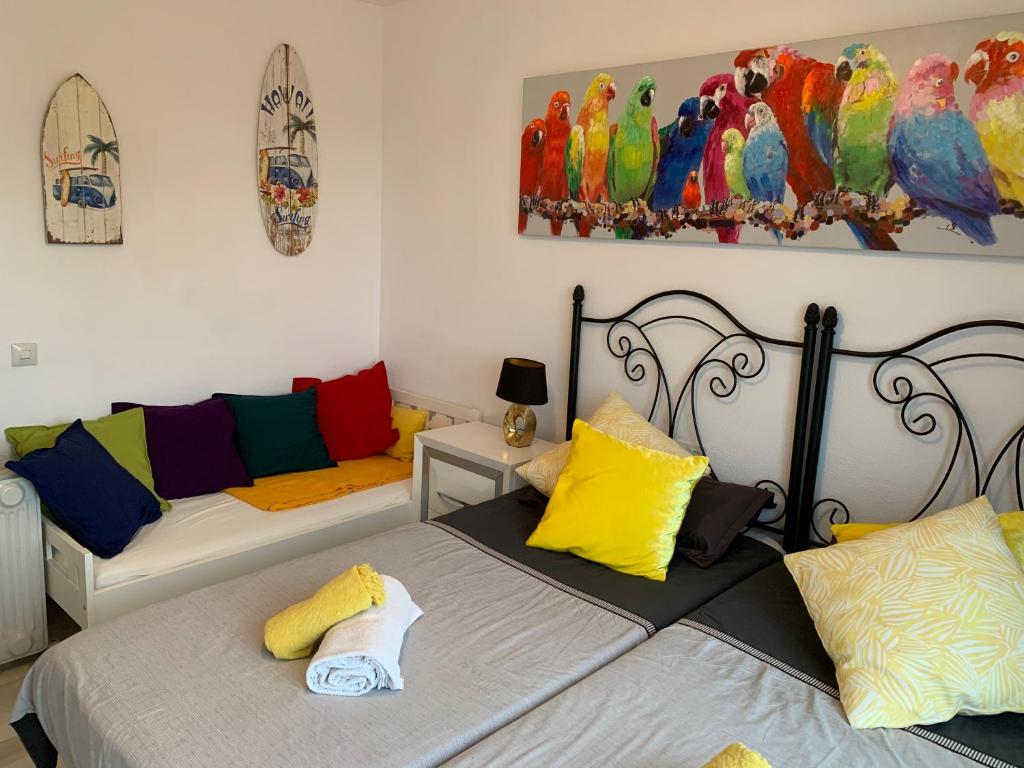 A bed or beds in a room at Maison Mijas Costa