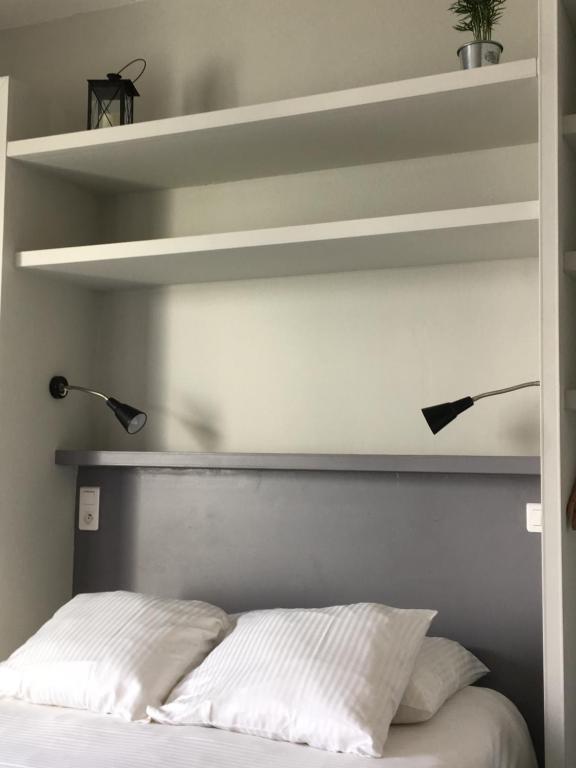 Postel nebo postele na pokoji v ubytování Le Cannier Hotel