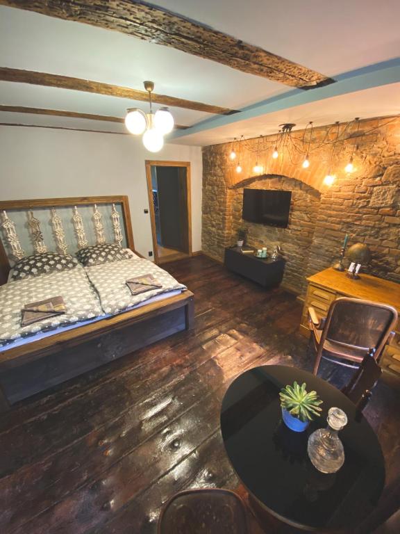 Postel nebo postele na pokoji v ubytování Penzion U Fridy Apartman 1