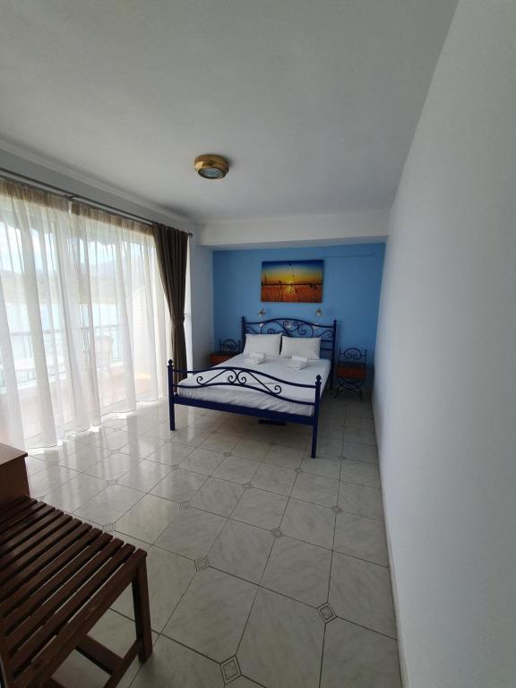 Postel nebo postele na pokoji v ubytování Hotel Mike