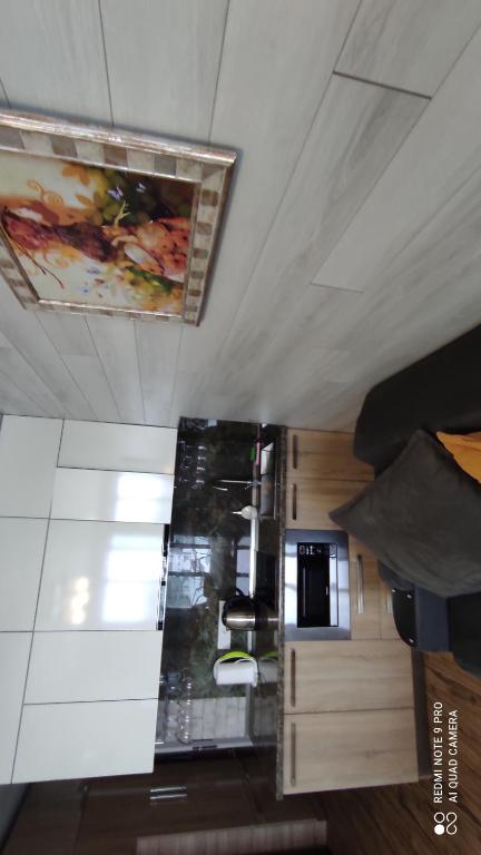 Kuchyň nebo kuchyňský kout v ubytování neu gudauri loft2 с видом на горы