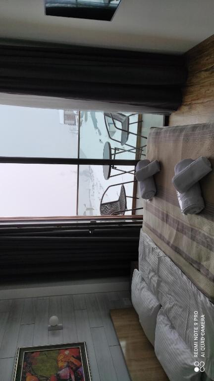 Posezení v ubytování neu gudauri loft2 с видом на горы