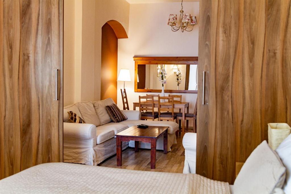 Posteľ alebo postele v izbe v ubytovaní Lounge Apartments