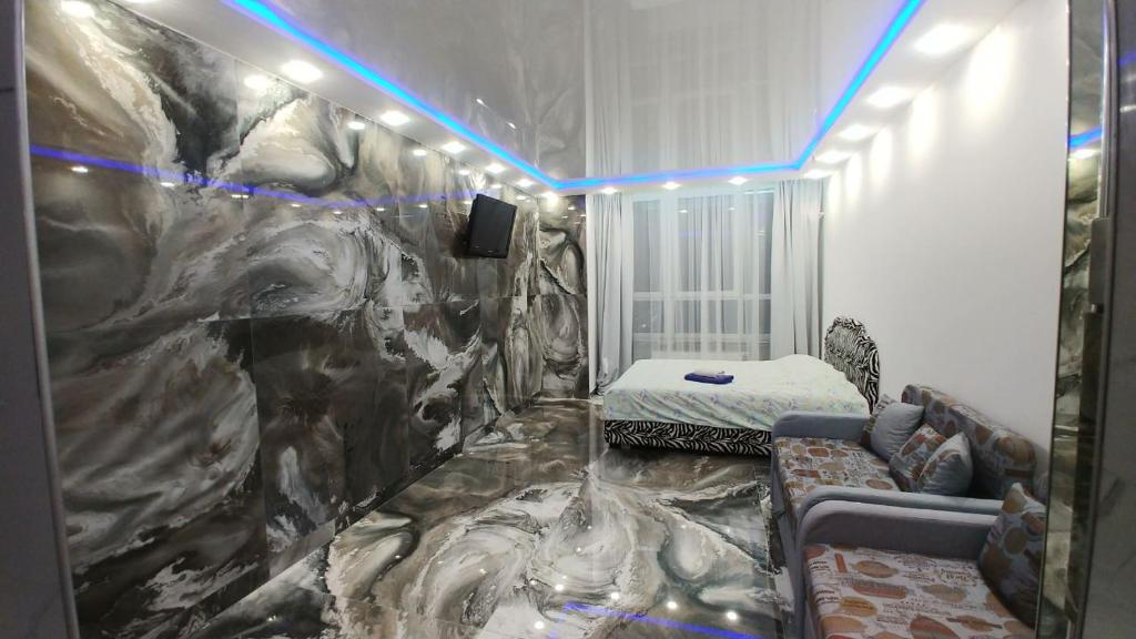 Ένα ή περισσότερα κρεβάτια σε δωμάτιο στο Видовая 25й этаж. Новый дом. Шалимова, ISIDA. Шулявская, Гарматная, Индустриальный мост. Космополитан. Большевик. Жд вокзал.