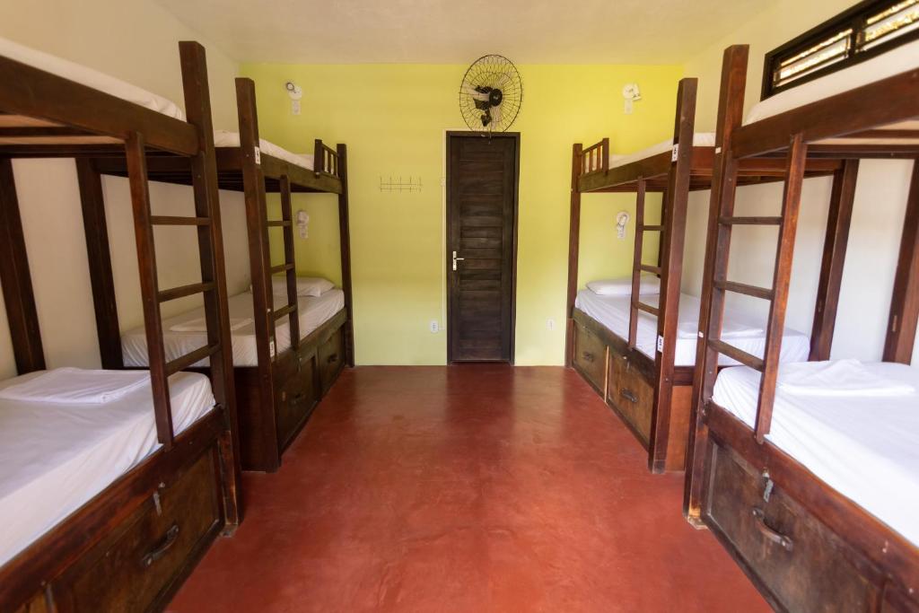 Postel nebo postele na pokoji v ubytování Surfcamp Arara