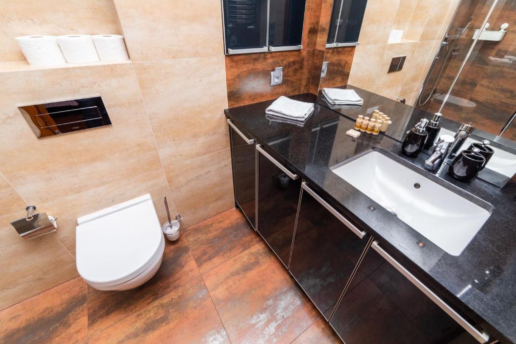 Kúpeľňa v ubytovaní Broadway - Neptun Park by OneApartments
