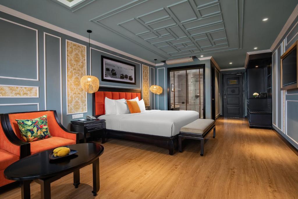 Postel nebo postele na pokoji v ubytování Bel Marina Hoi An Resort