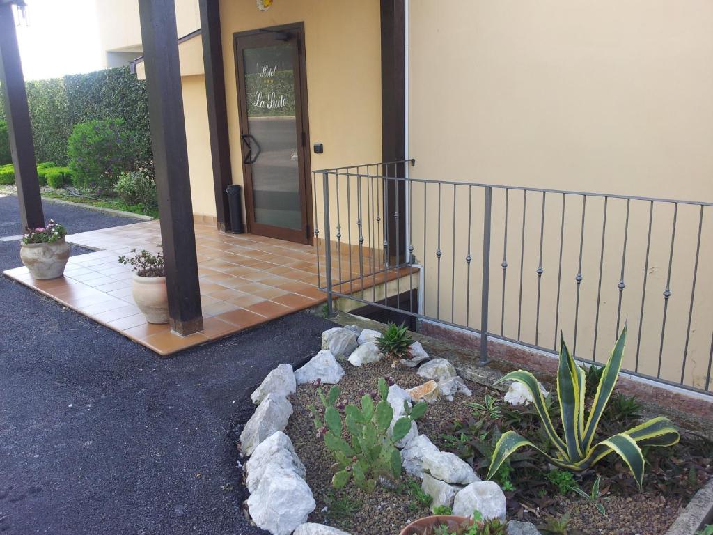 Zahrada ubytování Hotel Piscina La Suite