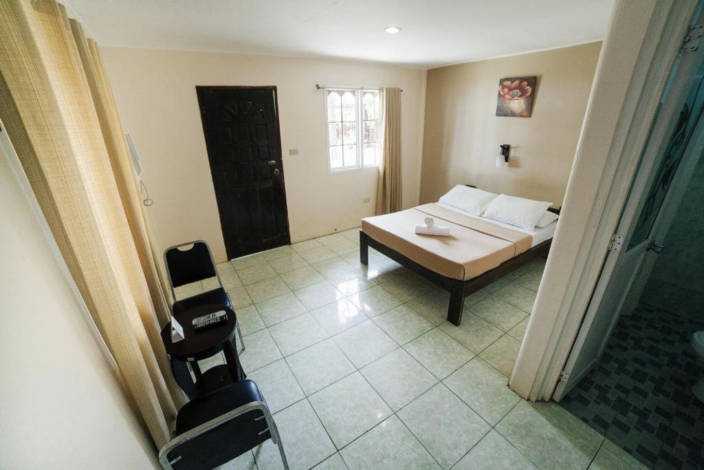 Postel nebo postele na pokoji v ubytování Panglao Grande Resort 邦劳美丽度假村