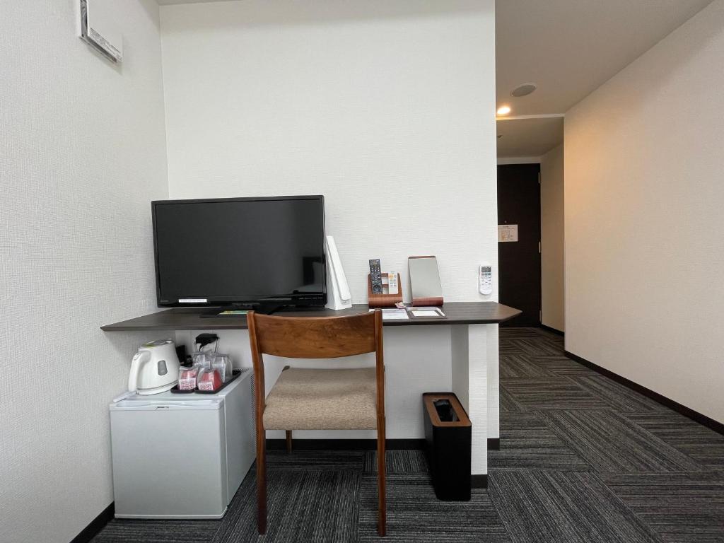 TV a/nebo společenská místnost v ubytování Okachimachi Urban Hotel