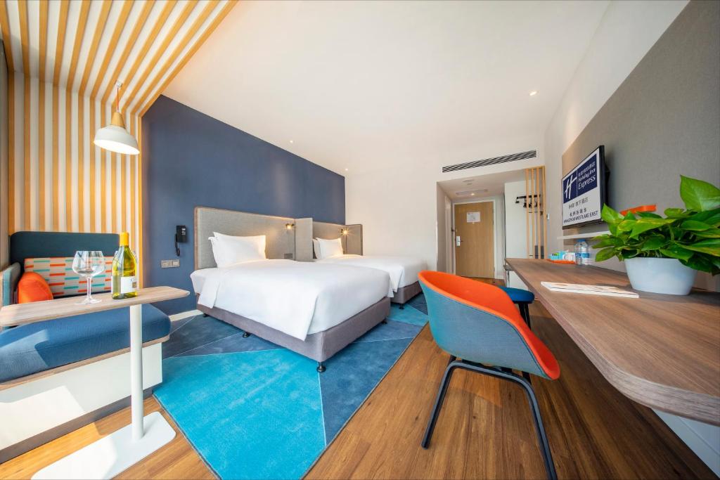Holiday Inn Express Hangzhou Westlake East by IHGにあるベッド