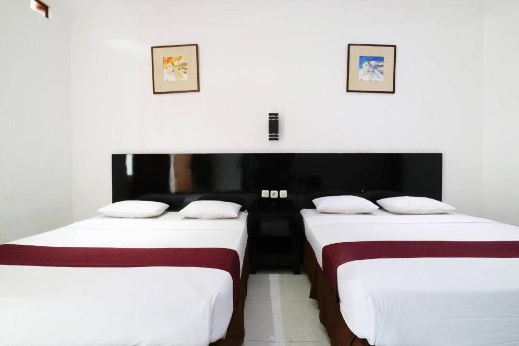 Postel nebo postele na pokoji v ubytování Narima Resort Hotel