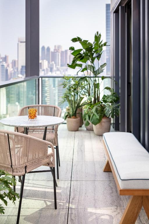 A balcony or terrace at The Hari Hong Kong