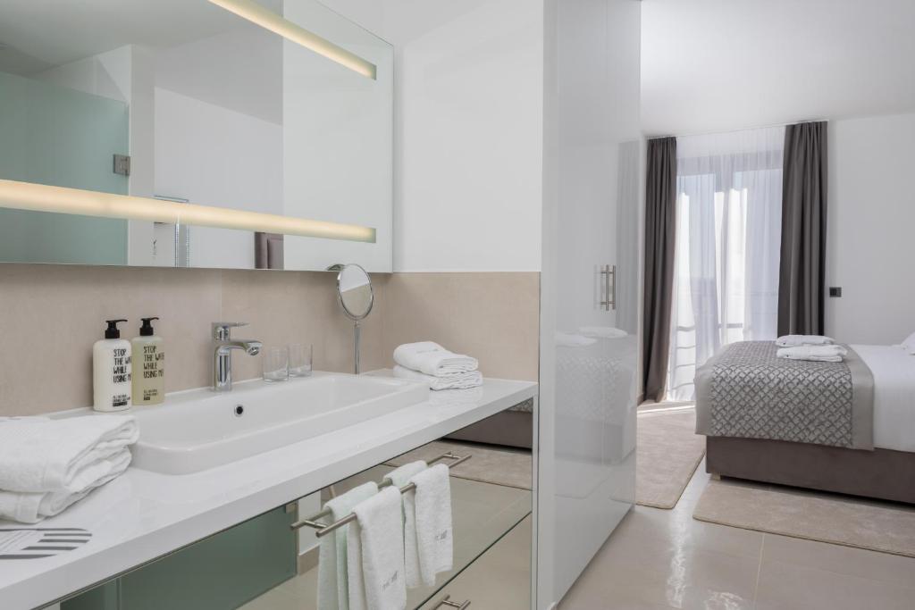 Posteľ alebo postele v izbe v ubytovaní Villas Baotić