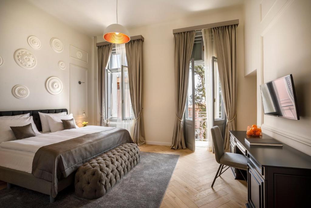 Säng eller sängar i ett rum på Heritage Hotel Imperial - Liburnia