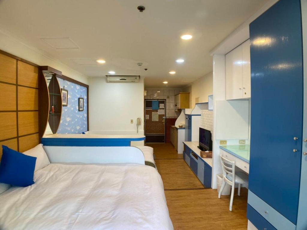 Postel nebo postele na pokoji v ubytování MB Hotel