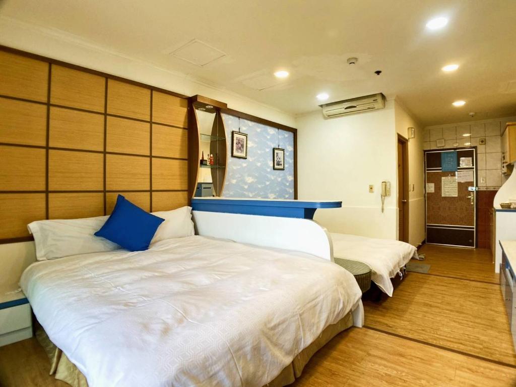 Postel nebo postele na pokoji v ubytování MB Hotel