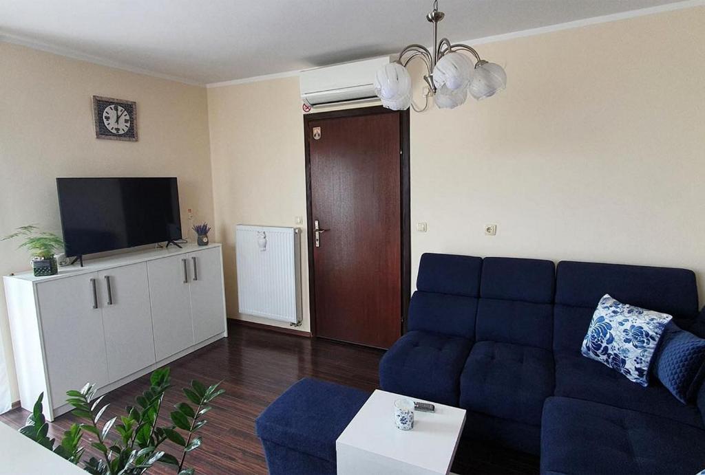 TV a/nebo společenská místnost v ubytování Apartments TB
