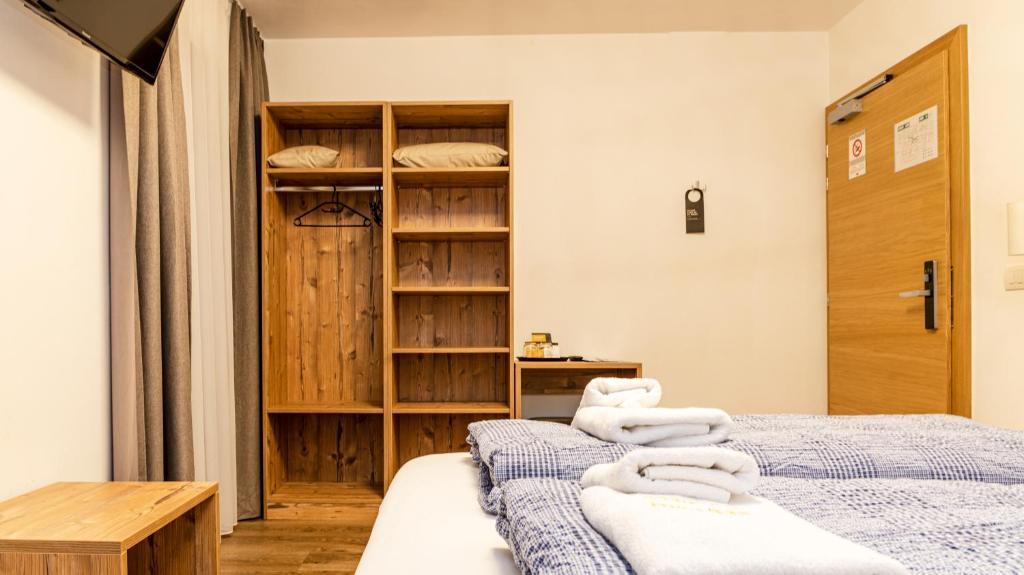Postel nebo postele na pokoji v ubytování B&B Hotel Sonneck