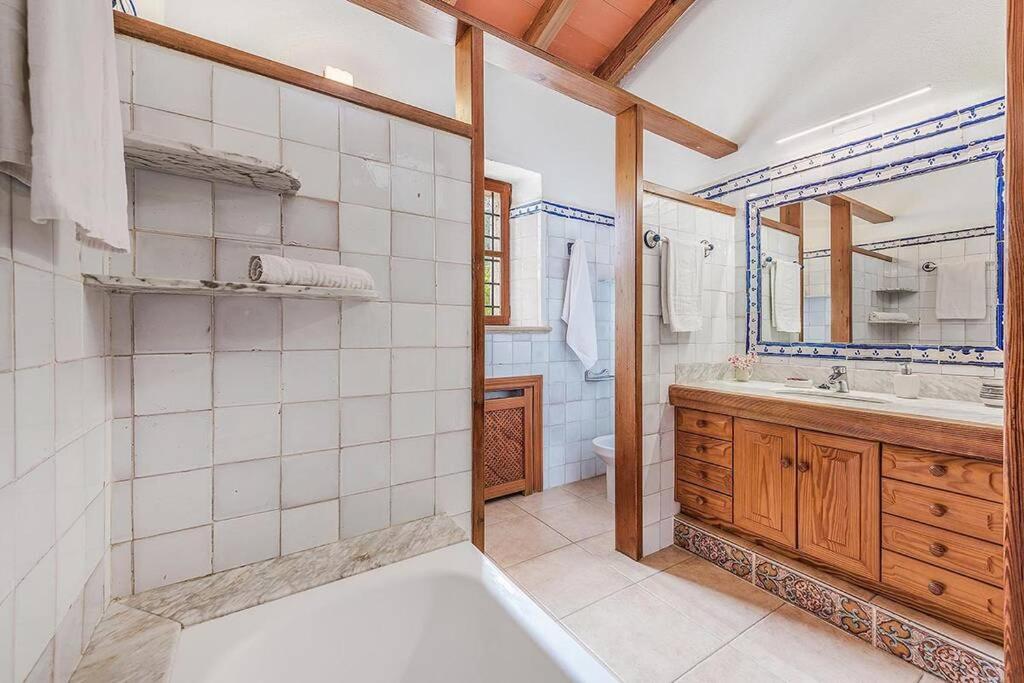 A bathroom at Finca Rafalet, Pollensa by Renthousing