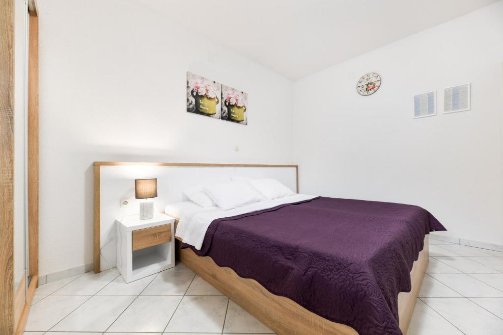 Posteľ alebo postele v izbe v ubytovaní Apartments Diora