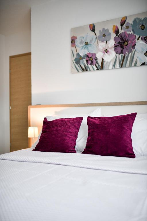 Posteľ alebo postele v izbe v ubytovaní Apartments Diora