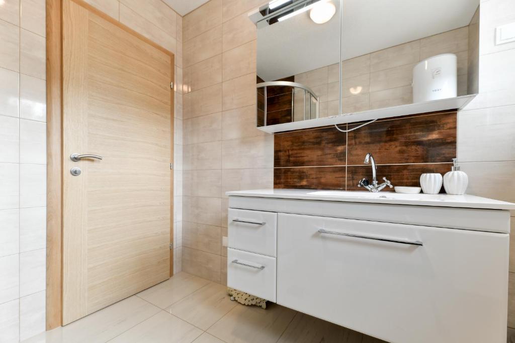 Kúpeľňa v ubytovaní Apartments Diora